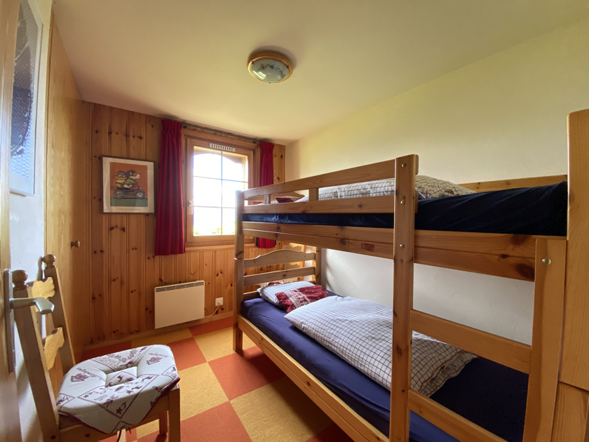 Childrens, bedroom with bunkbed and built-in wardrobe